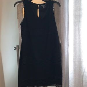 Black embroidered dress.